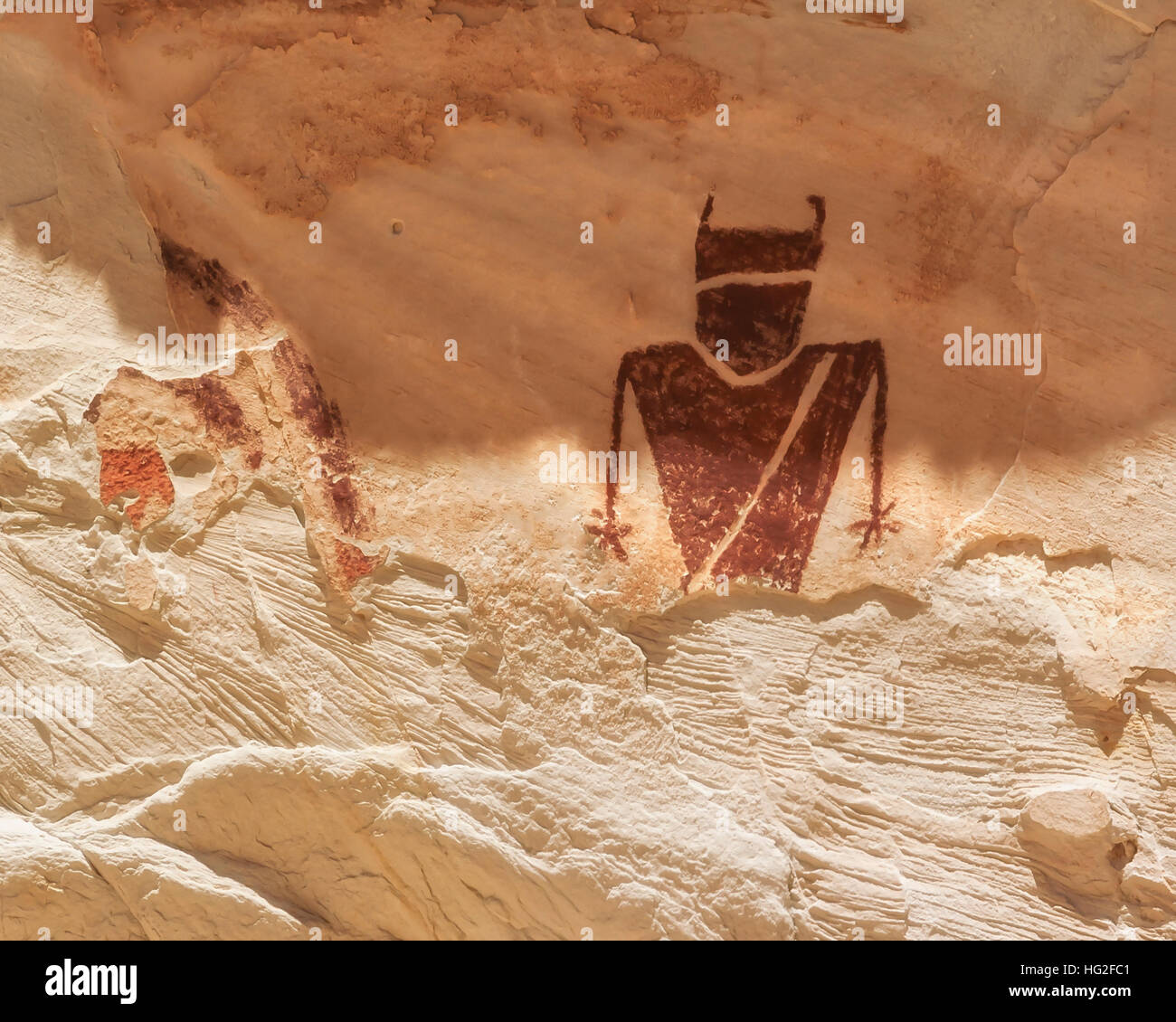 Il parco statale Goblin Valley.uno sciamano il pittogramma disegnato nella barriera Canyon stile di cultura. Foto Stock