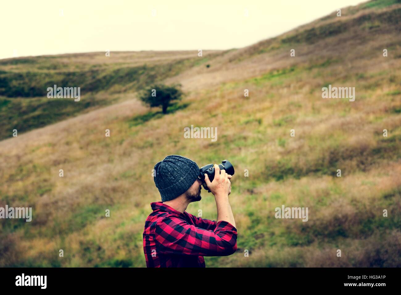 Uomo fotocamera fotografia della natura il concetto di ambiente Foto Stock