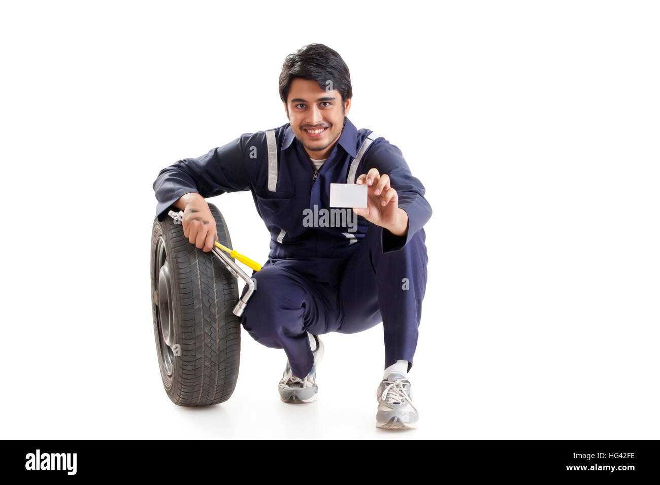 Mechanic mostra blank business card Foto Stock