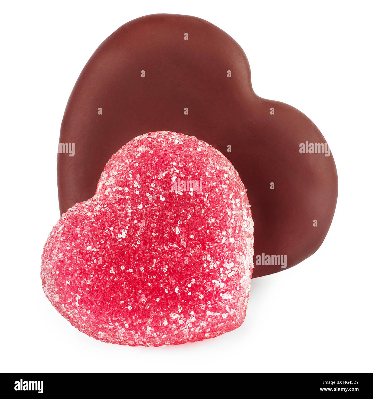 Set di cibo dolce per il giorno di San Valentino di forma cuore di cioccolato e caramelle jelly isolati su sfondo bianco Foto Stock
