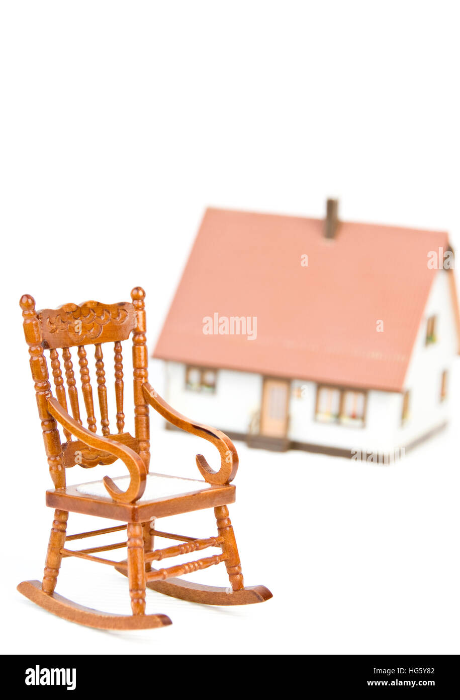 La sedia a dondolo e casa Foto Stock