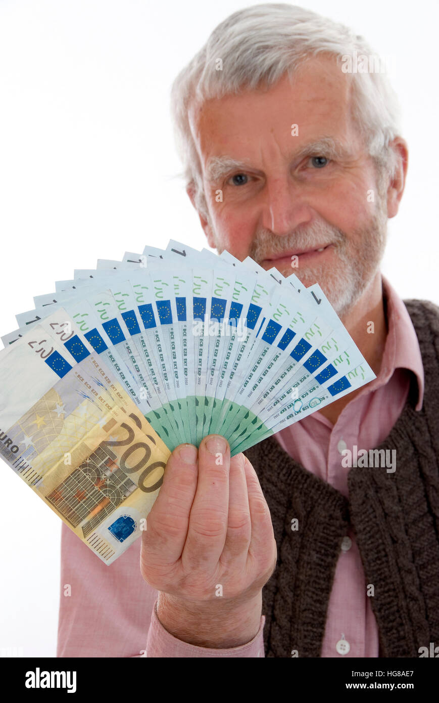 Pensionato con denaro Foto Stock
