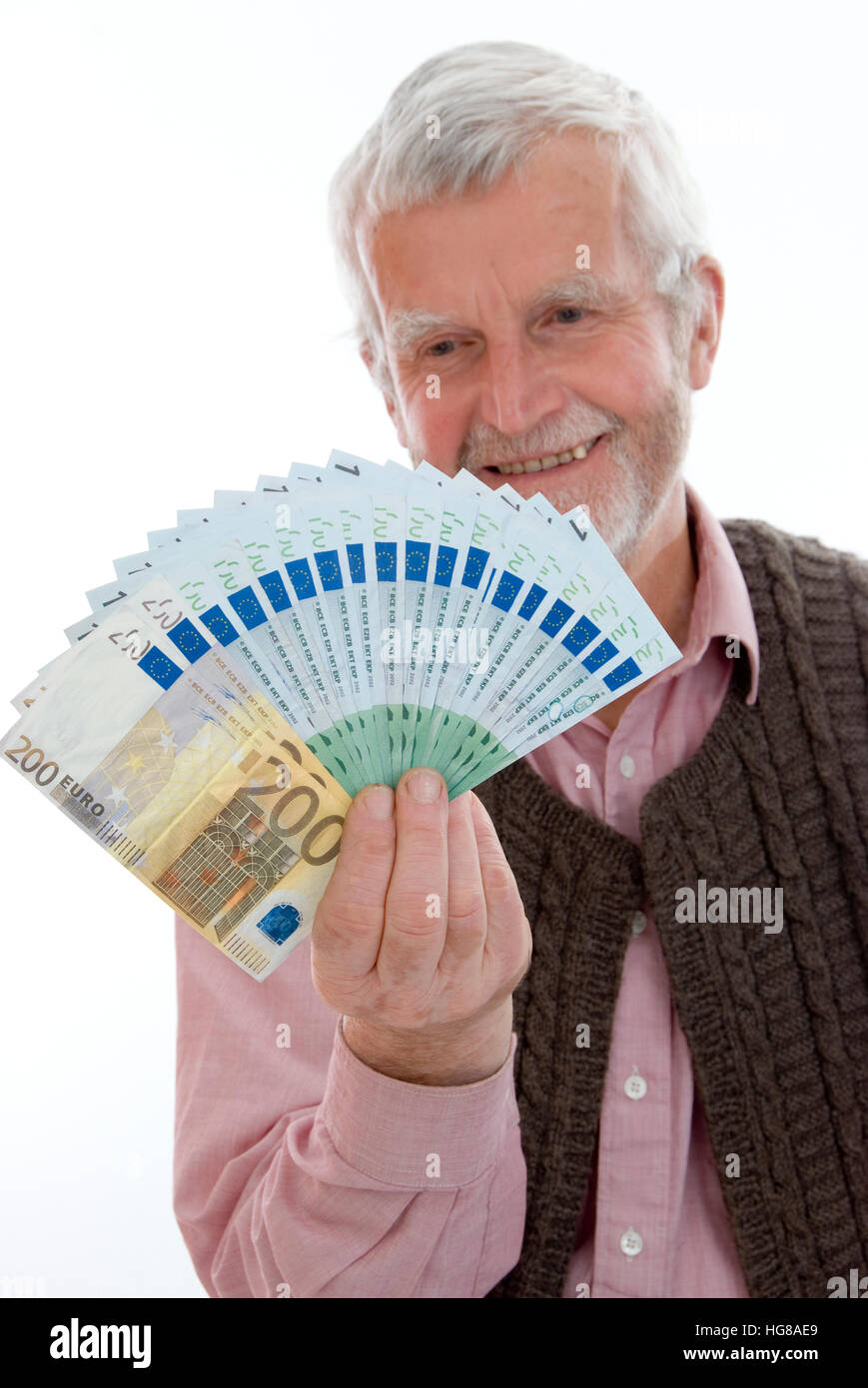 Pensionato con denaro Foto Stock