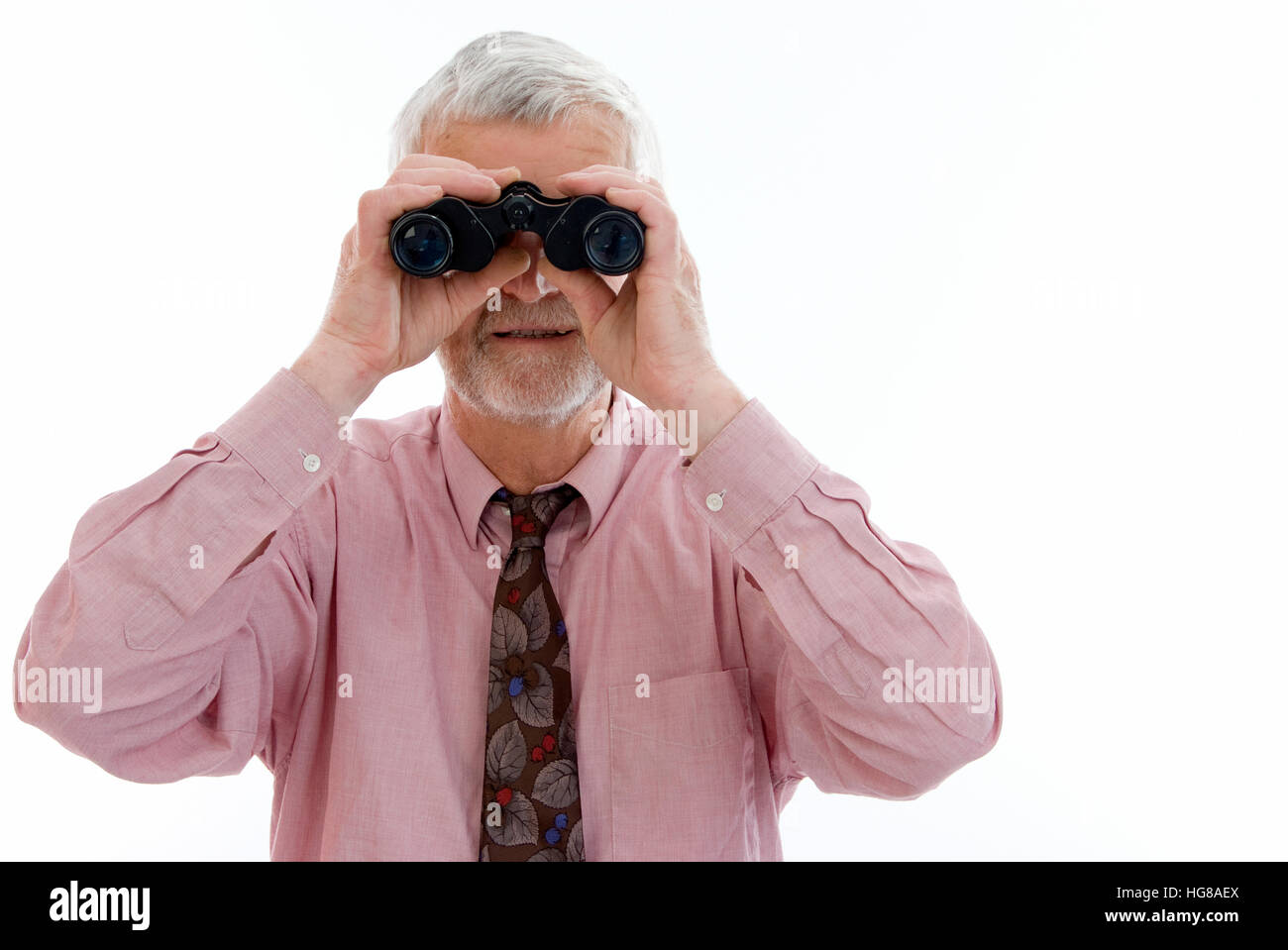 Pensionato con il cannocchiale Foto Stock