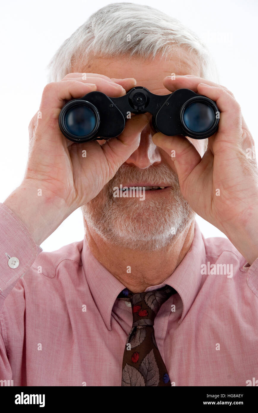 Pensionato con il cannocchiale Foto Stock