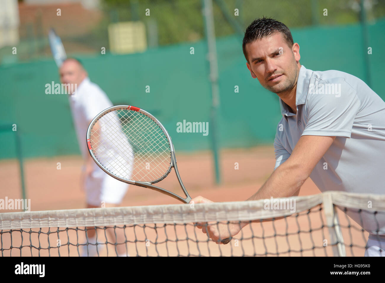 Un intenso gioco di tennis Foto Stock