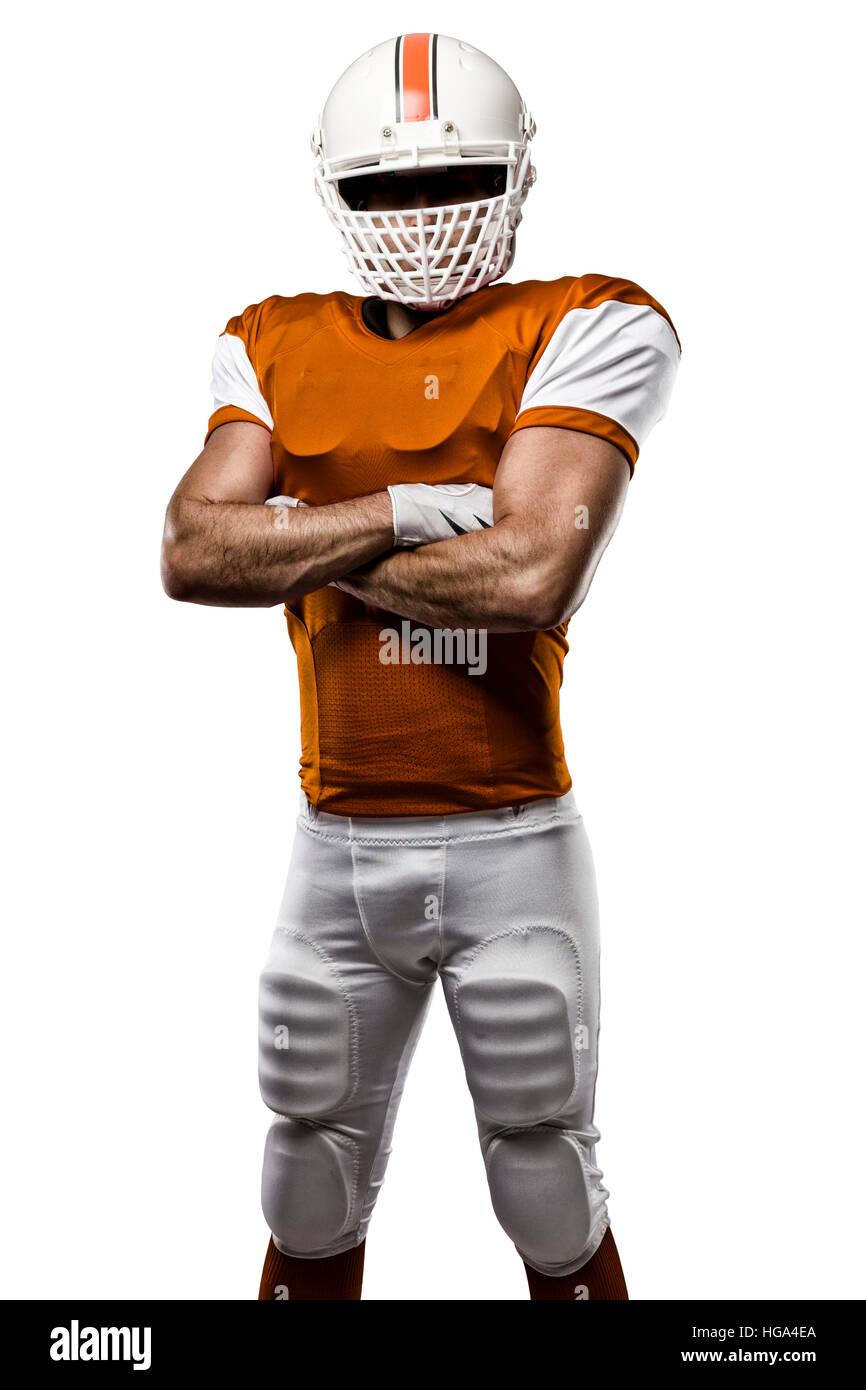 Giocatore di calcio con una uniforme di colore arancione su sfondo bianco. Foto Stock Giocatore di calcio con una uniforme di colore arancione su sfondo bianco. Foto Stock