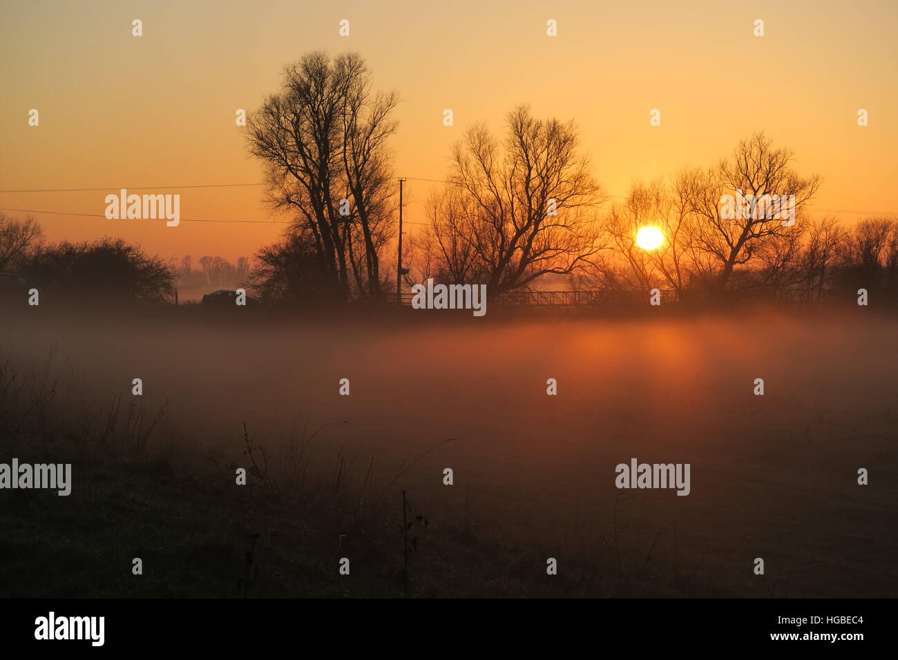 Tramonto in inverno, Sutton Gault, Ouse lavaggi Foto Stock