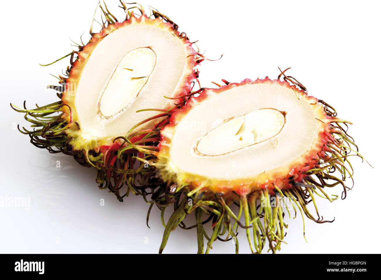 Cut-aprire Rambutan (Nephelium lappaceum) Foto Stock