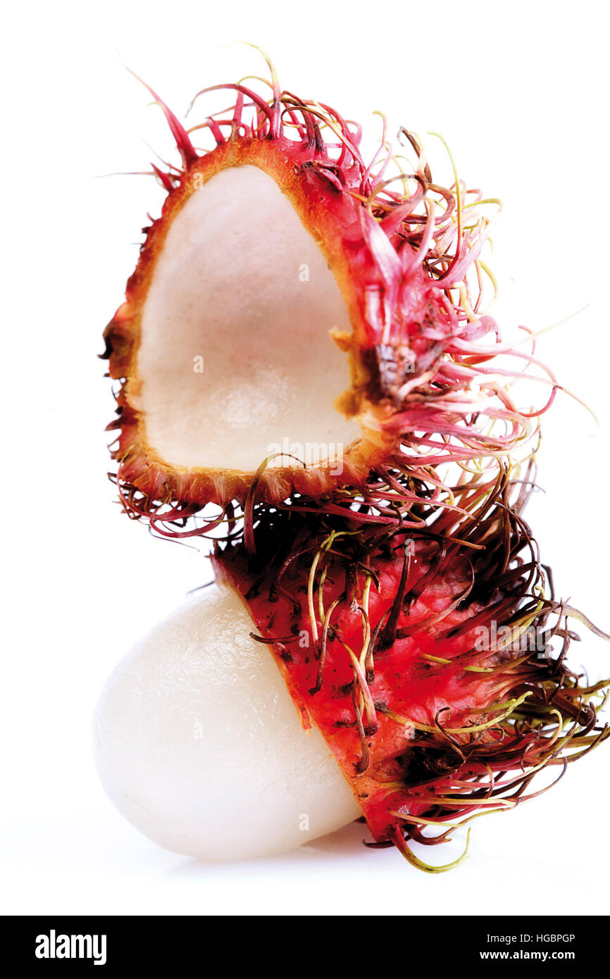 Cut-aprire Rambutan (Nephelium lappaceum) Foto Stock