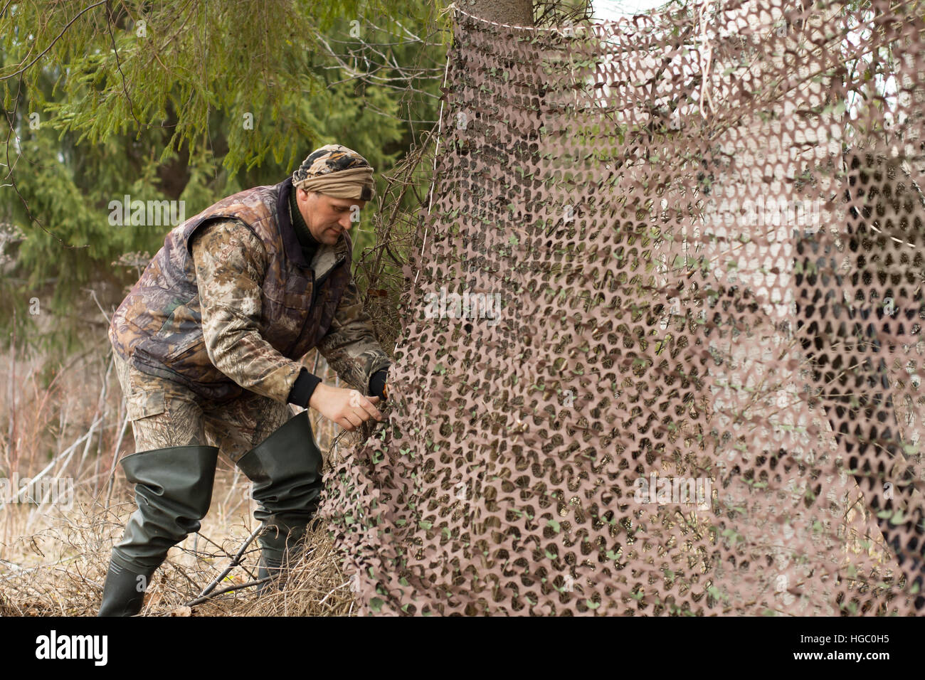 Hunter tira camouflage netting Foto Stock