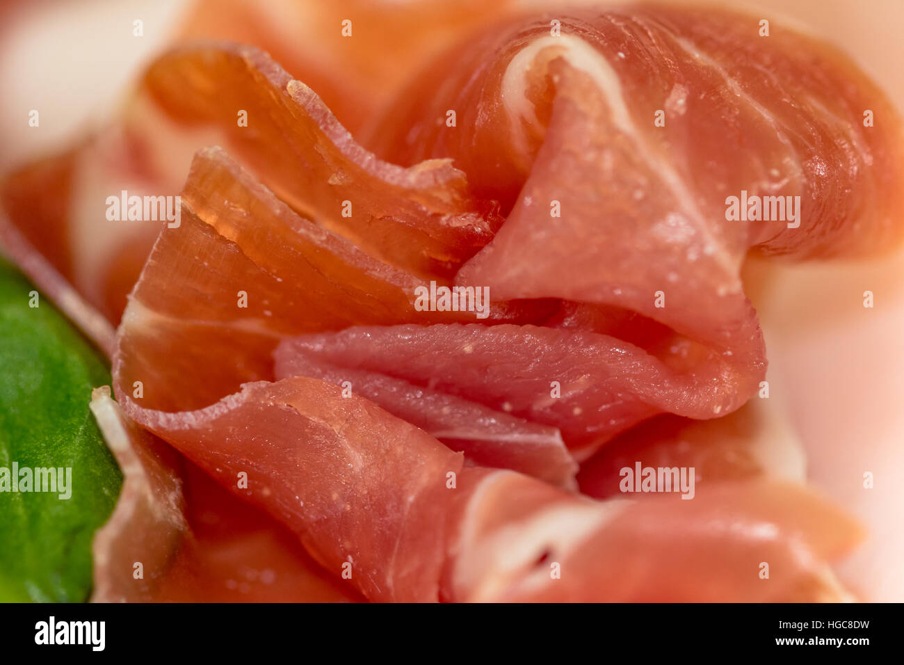 Antipasto con pancetta e insalata verde Foto Stock