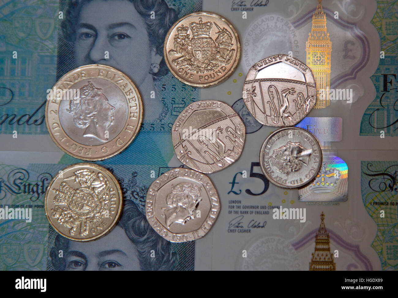Sterlina inglese delle monete e delle banconote, Londra Foto Stock