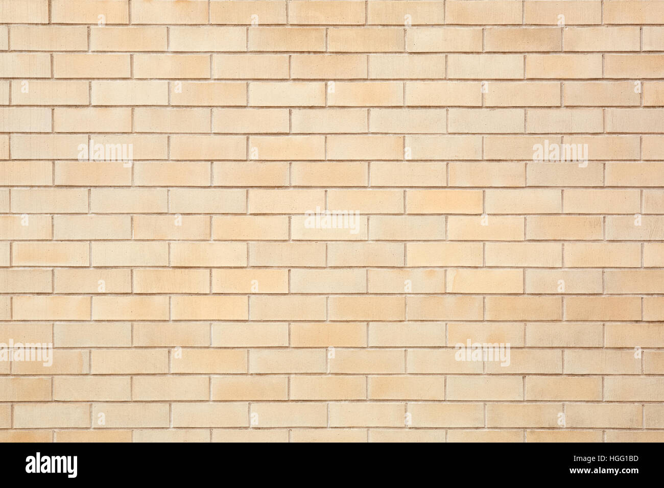 Mattoni Beige parete piastrellata sfondo texture Foto Stock