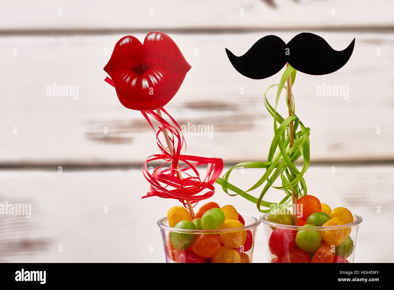 Props labbra, baffi con caramelle. Foto Stock