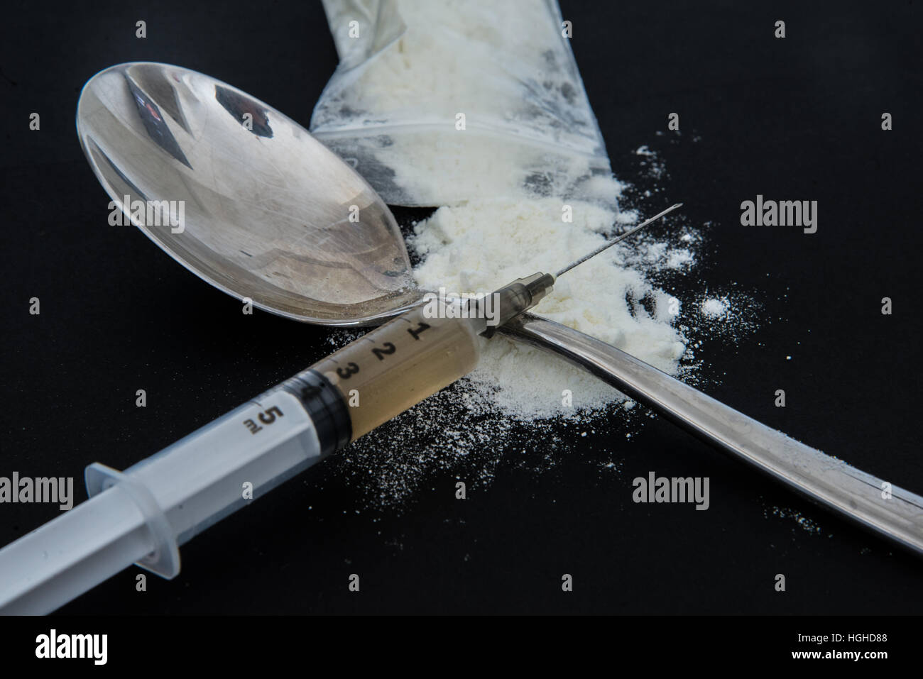 Droga illegale con siringa Foto Stock