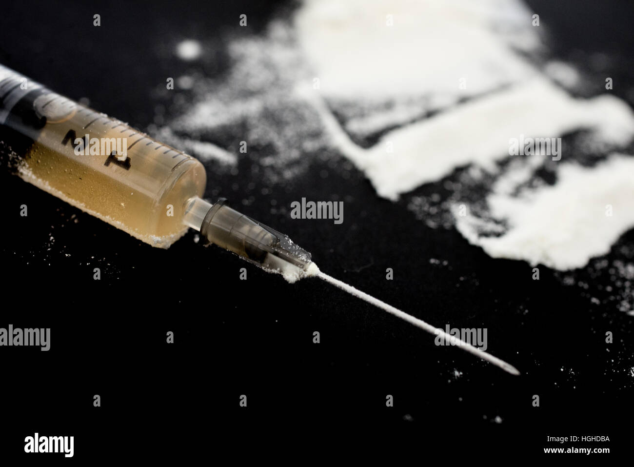 Droga illegale con siringa Foto Stock