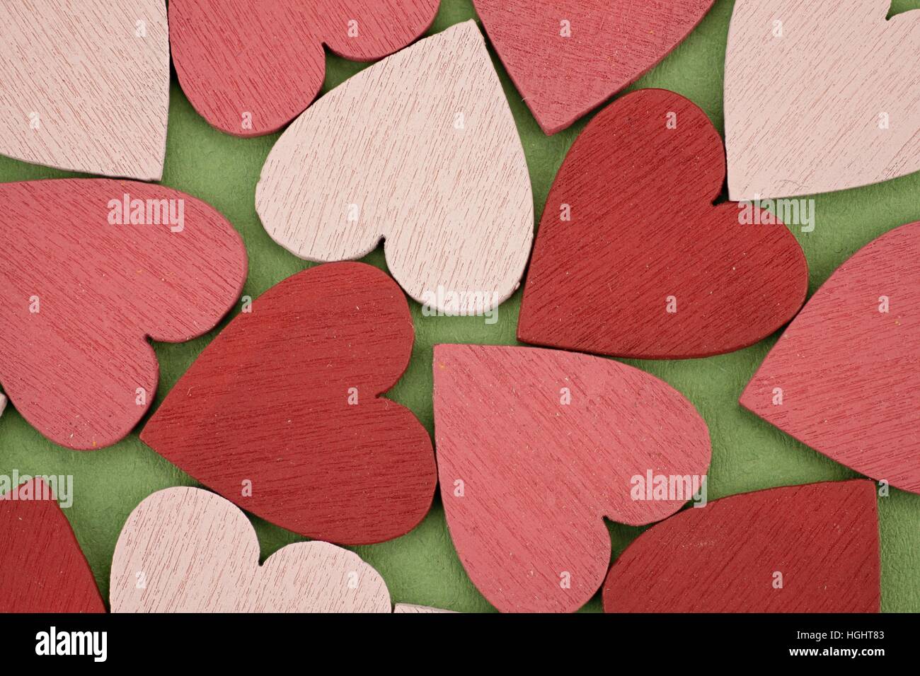 Lo sfondo costituito da molti rossi e Cuori rosa Foto Stock