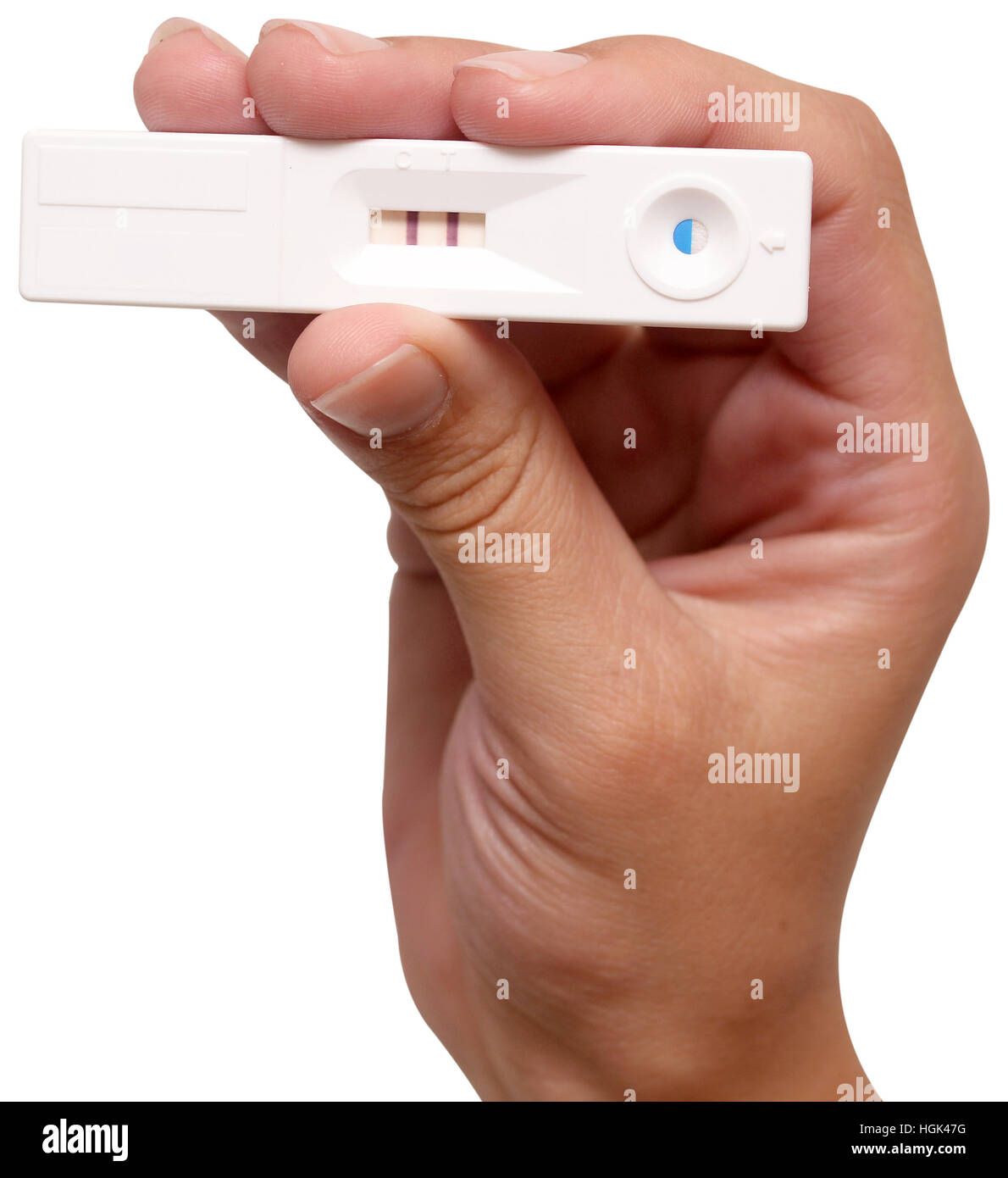 Test di gravidanza in mano su un bianco Foto Stock