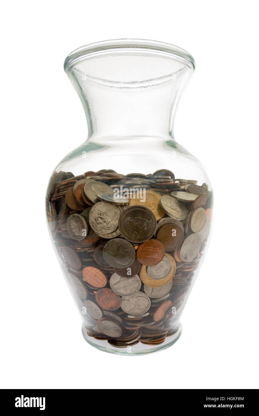 Ampio angolo di visione degli Stati Uniti monete raccolte in un generico cercando vaso di vetro Foto Stock