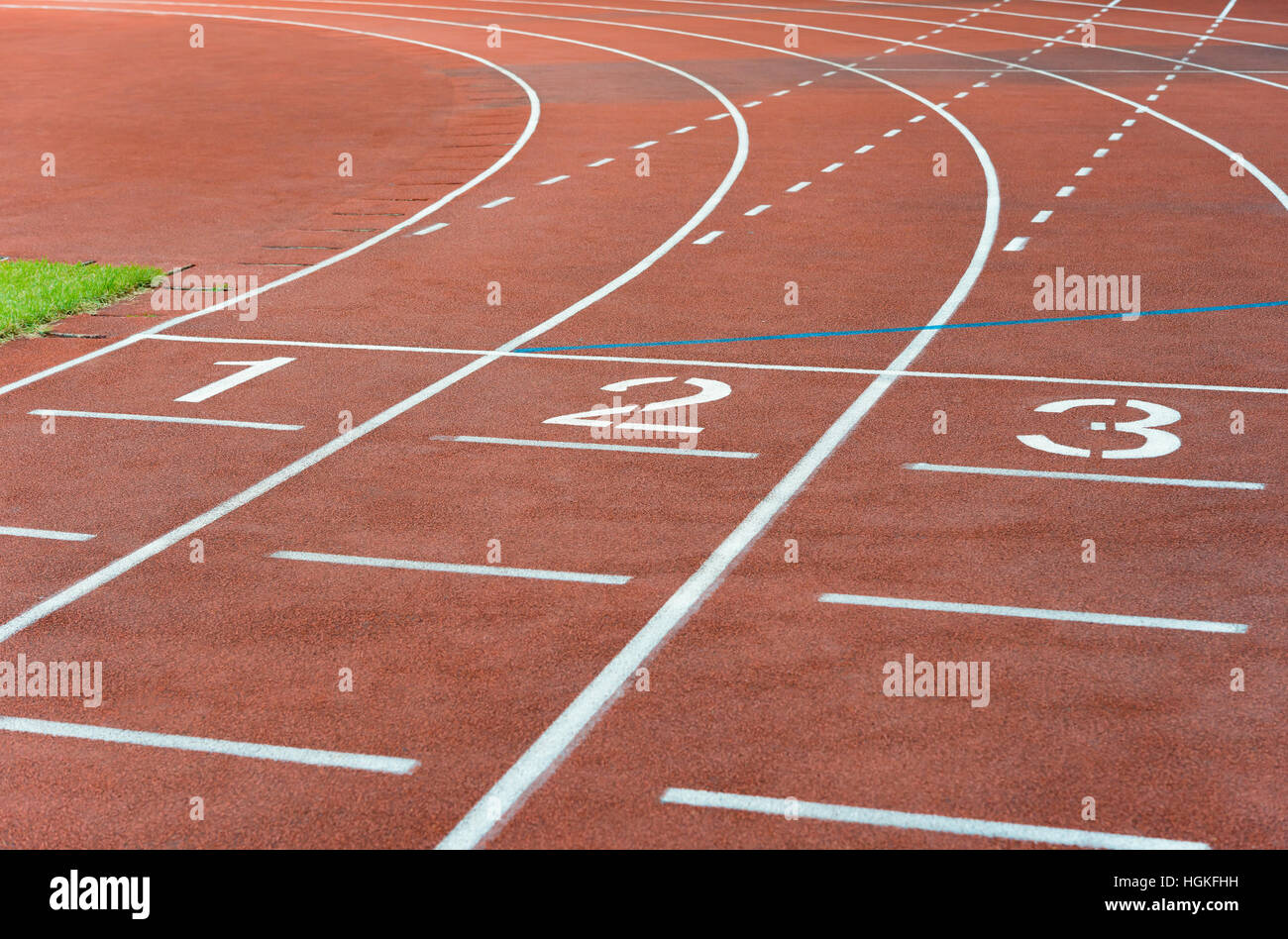 Terra no.1 a 3 di una pista in gomma con linee curve Foto Stock