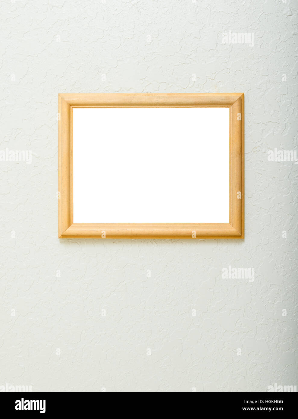 Un vuoto il telaio in legno su una texture di sfondo avorio. Camera per foto o altre opere d'arte in frame, con abbondanza di spazio di copia. Foto Stock
