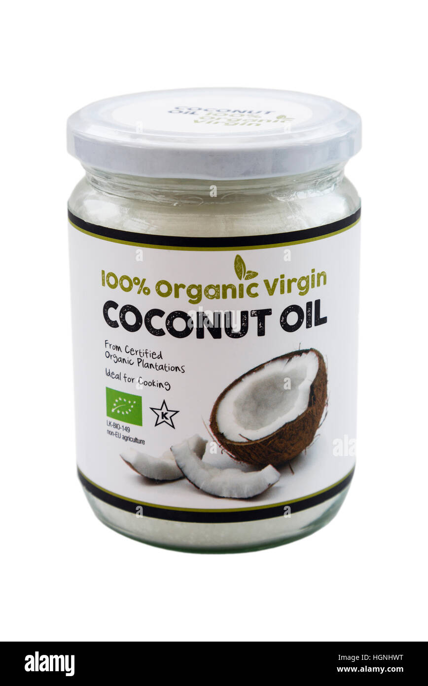 Vasetto di organico 100% vergine di olio di noce di cocco tagliata e isolata su uno sfondo bianco. Inghilterra Regno Unito Gran Bretagna Foto Stock