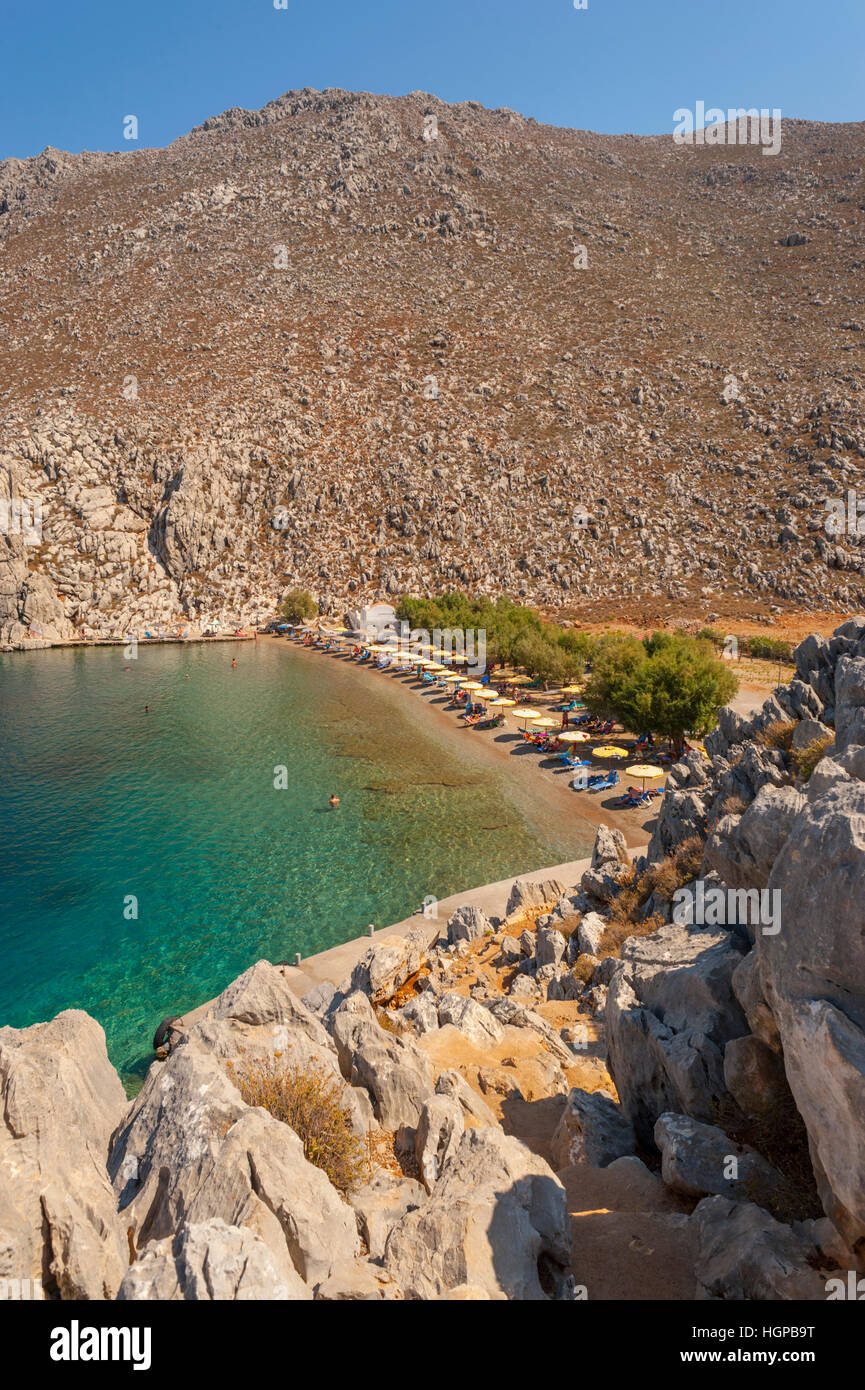 Guardando verso il basso sulla Saint Nicholas bay sull'isola greca di Symi. Foto Stock