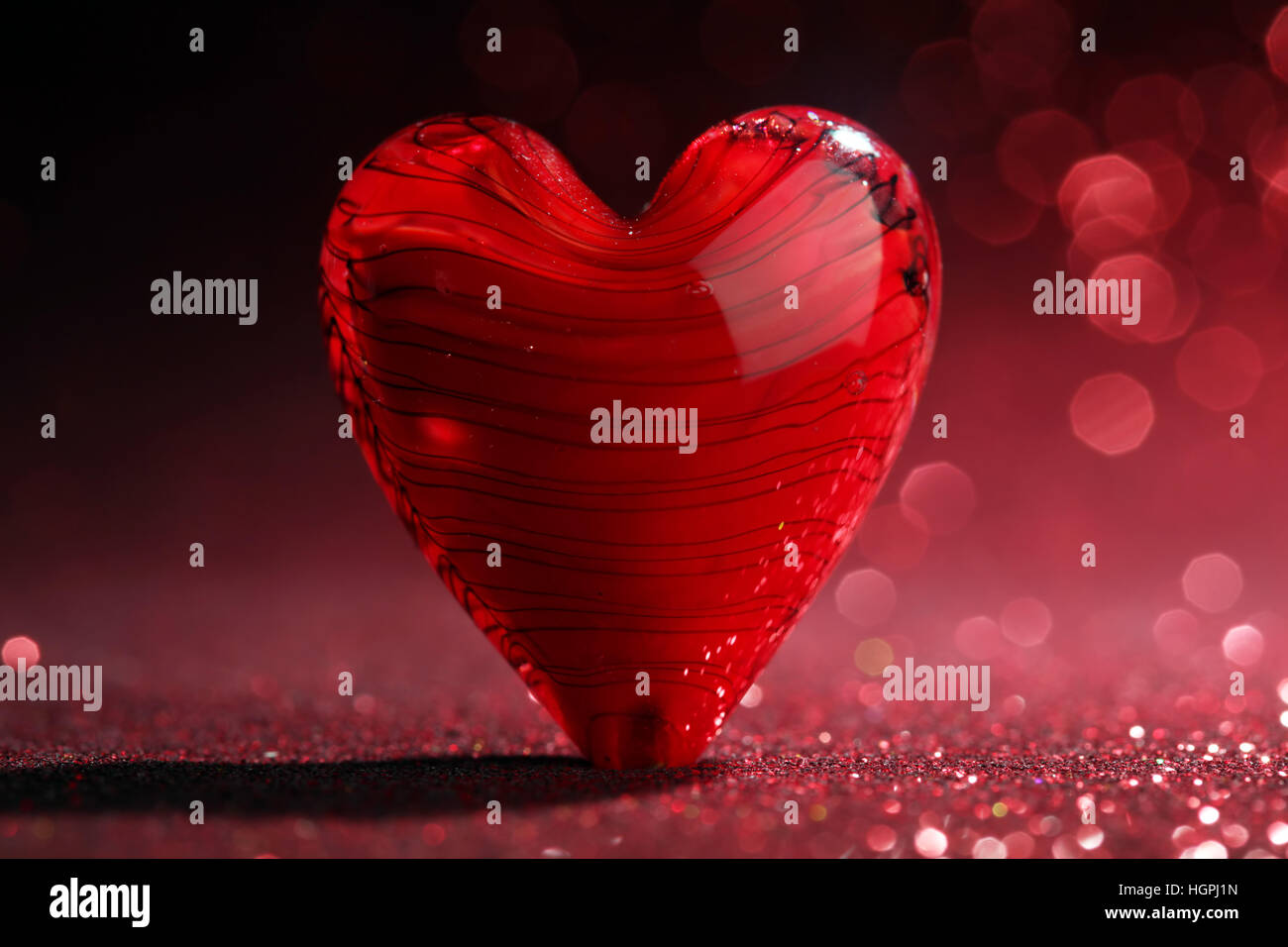 Rosso lucido cuore sfondo Foto Stock