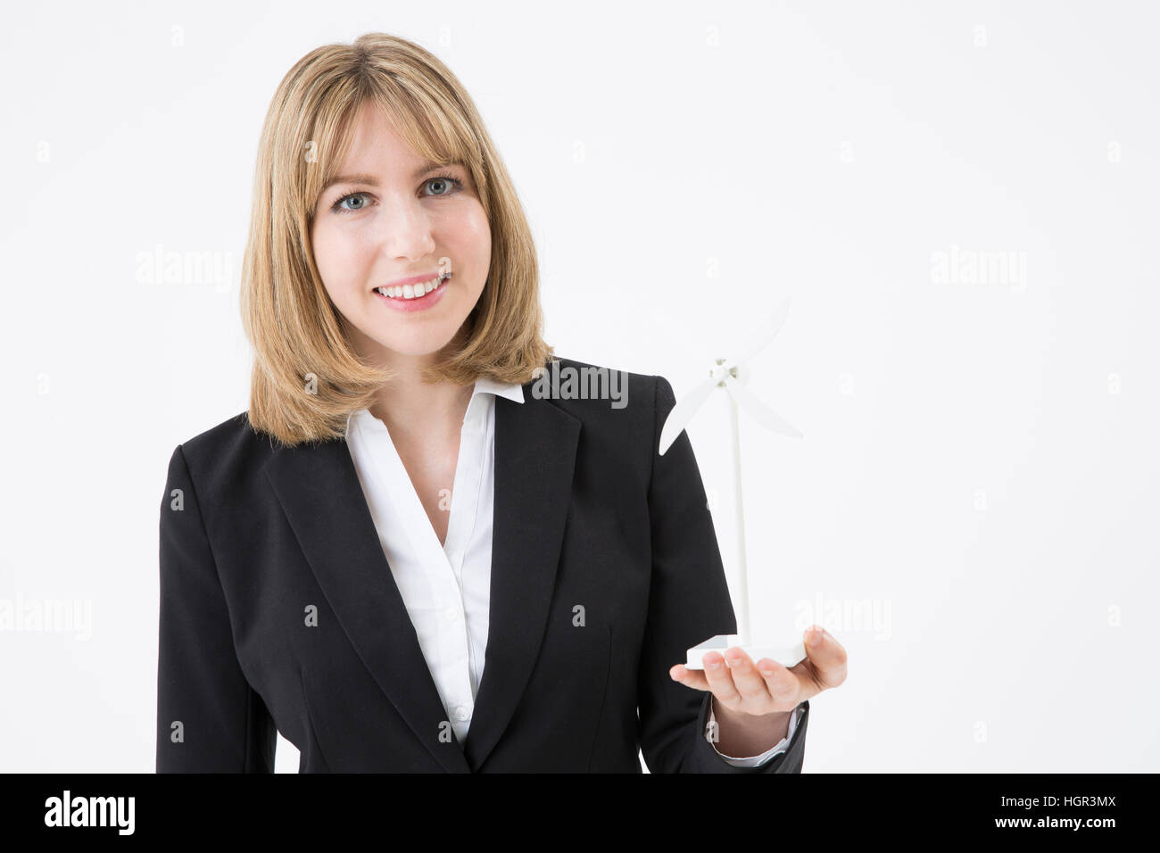 Ritratto di sorridente imprenditrice globale con la girandola Foto Stock