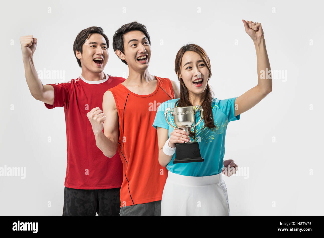 I giovani coreani sorridente gli sportivi tifo Foto Stock