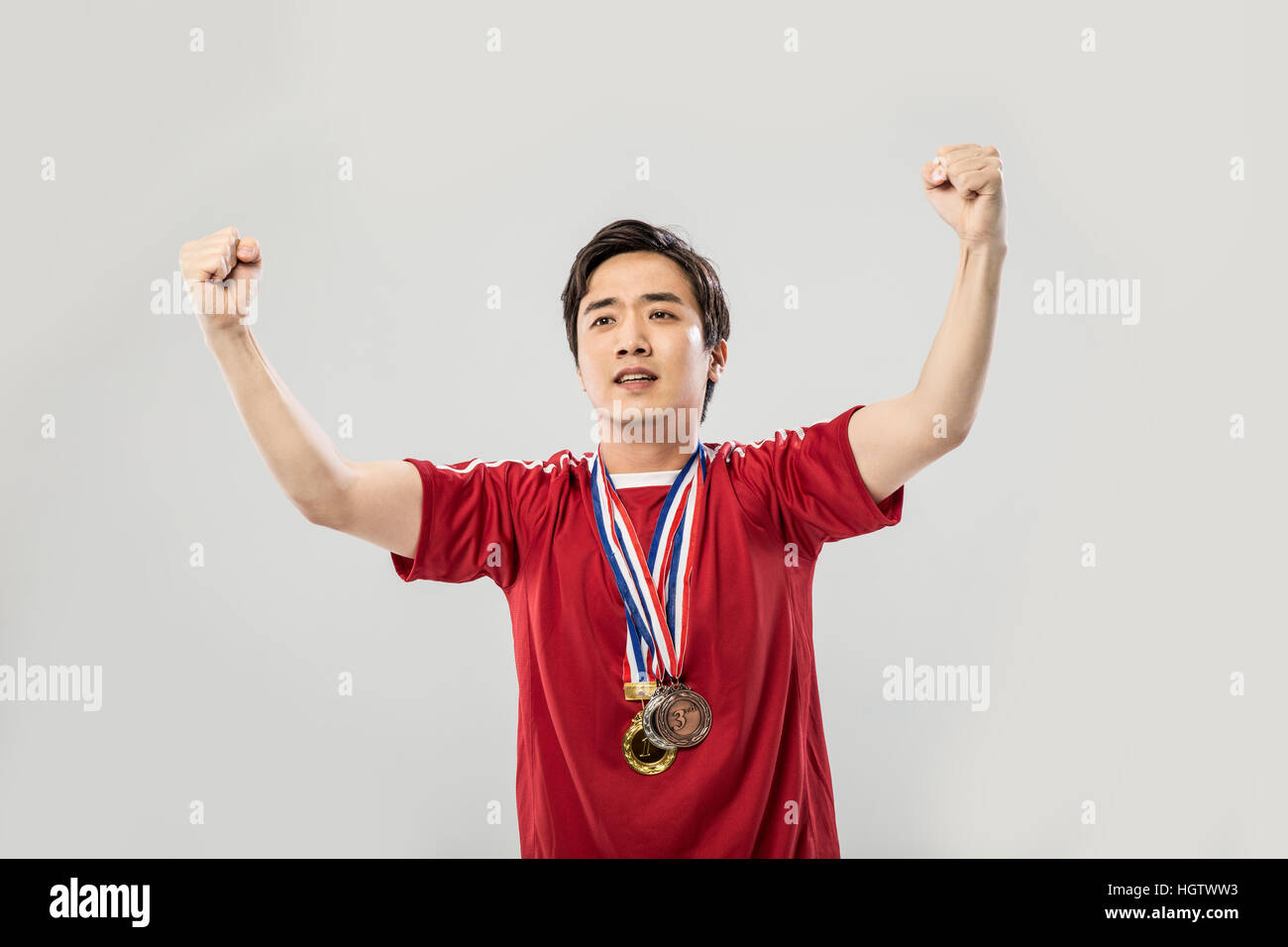 Ritratto di giovane sorridente maschio coreano Sports player Foto Stock