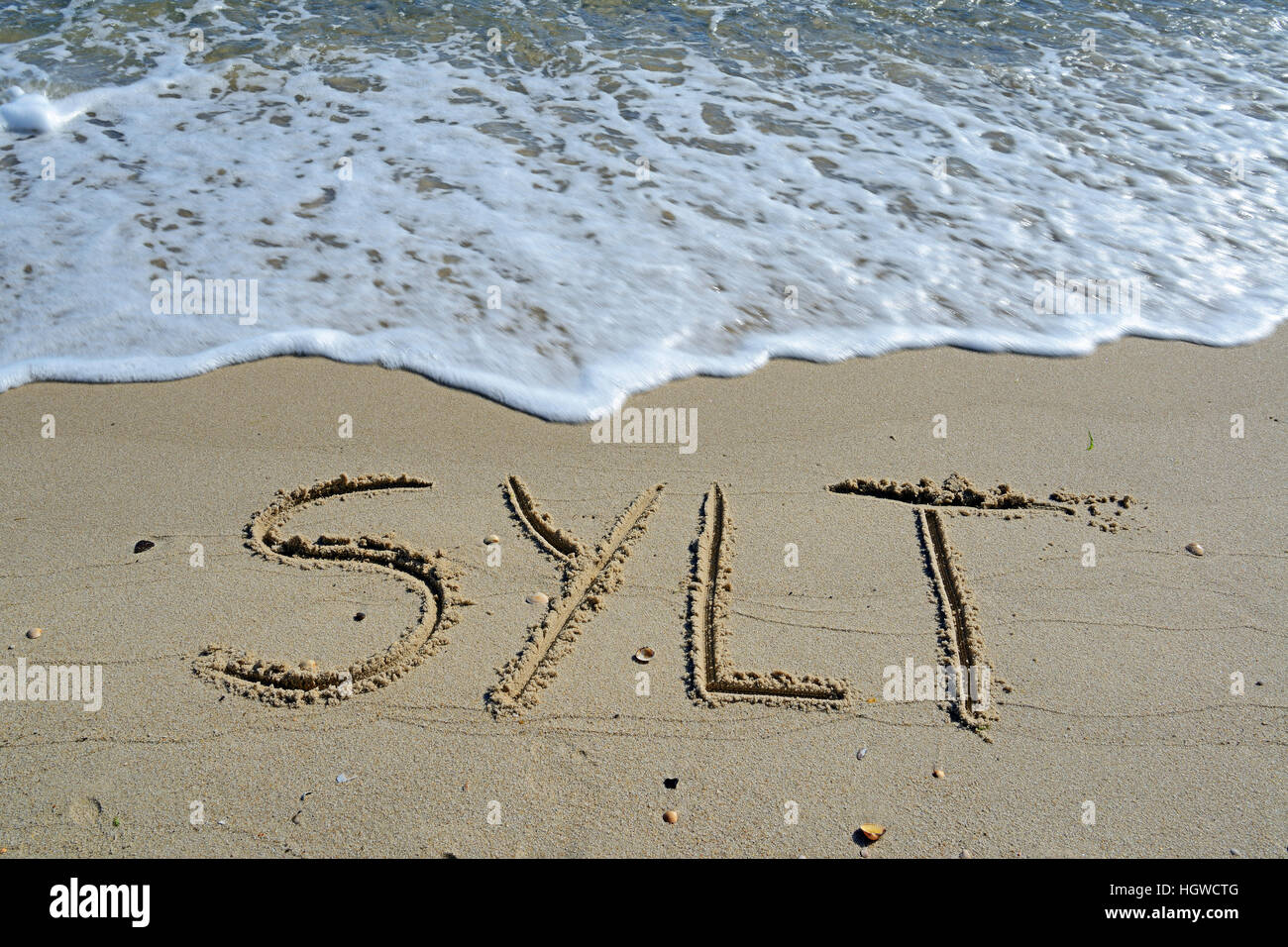 Schriftzug Sylt im Sand am Strand, Sylt, nordfriesische isole, Nordfriesland, Schleswig-Holstein, Germania Foto Stock