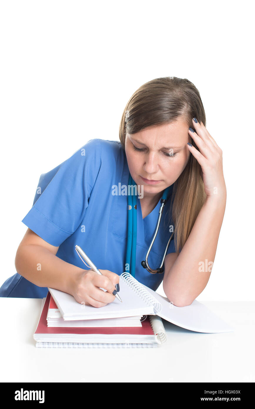 Medico donna studiare libri Foto Stock