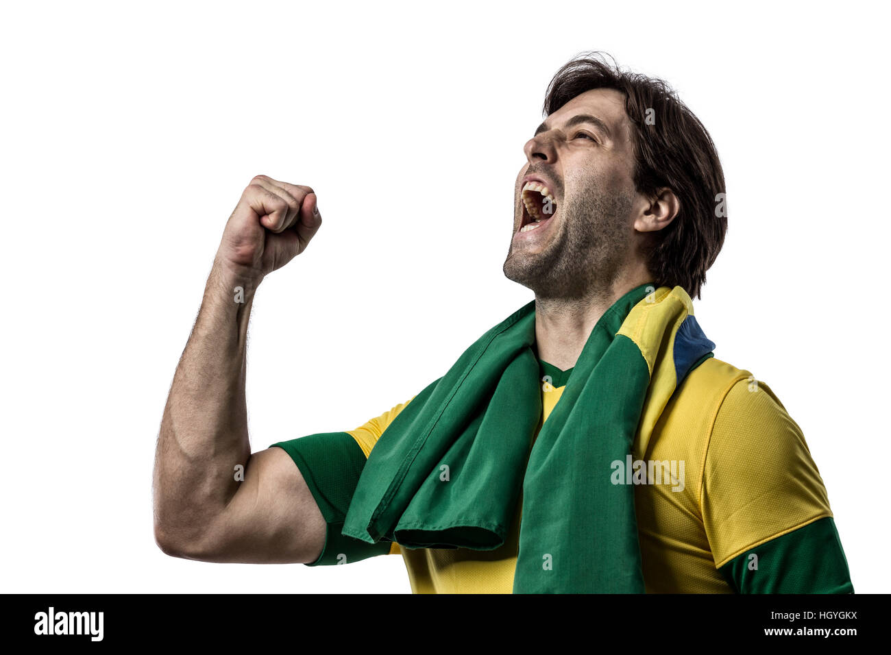 Calcio brasiliano player, celebrando su uno sfondo bianco. Foto Stock
