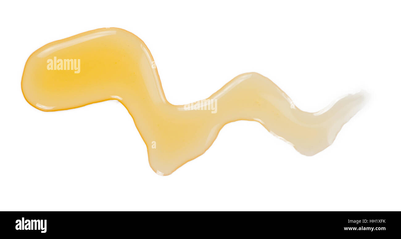 Porzione di caramello Sirup (come close-up shot) isolato su sfondo bianco Foto Stock