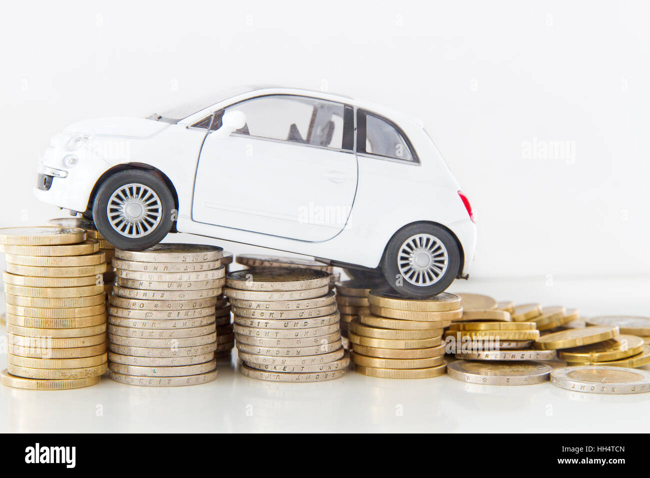 Auto un pile di monete Foto Stock