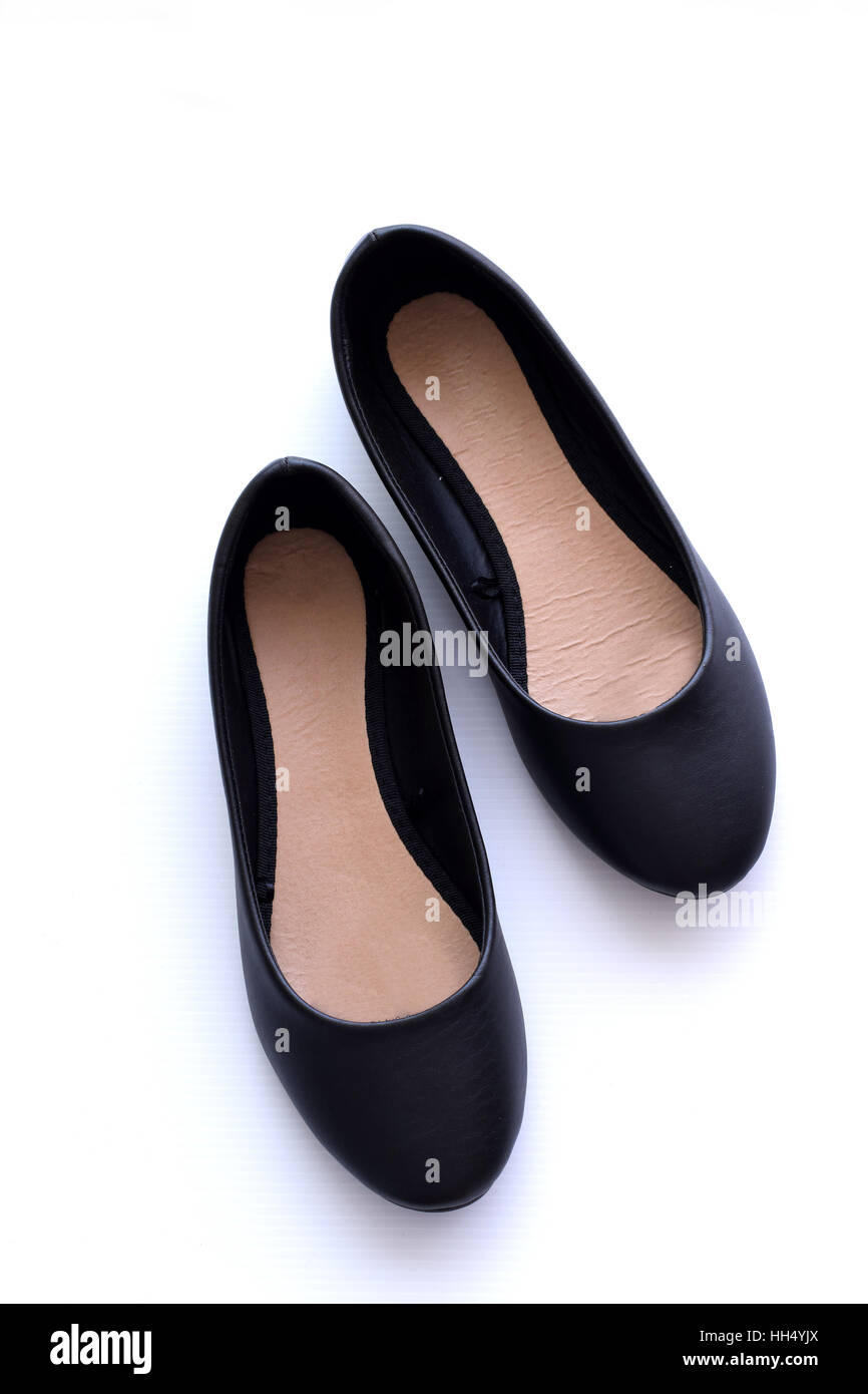 Onorevoli nero scarpe isolata contro uno sfondo bianco Foto Stock