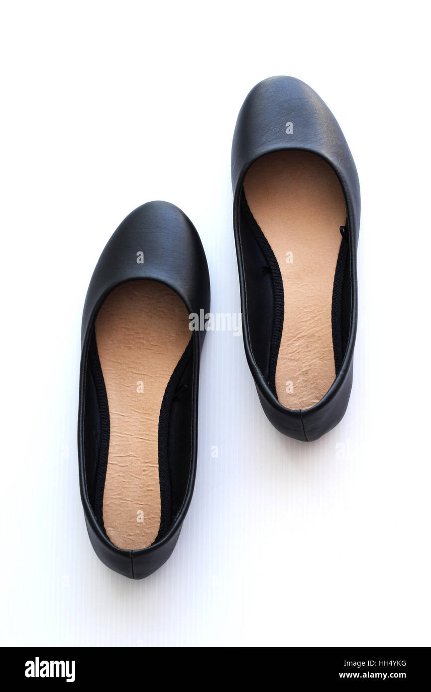 Onorevoli nero scarpe isolata contro uno sfondo bianco Foto Stock