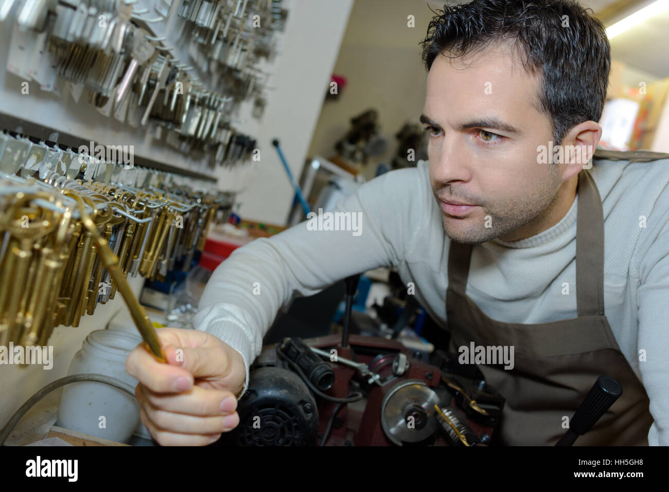 Coltello chiave selezionando il tasto da magazzino Foto Stock