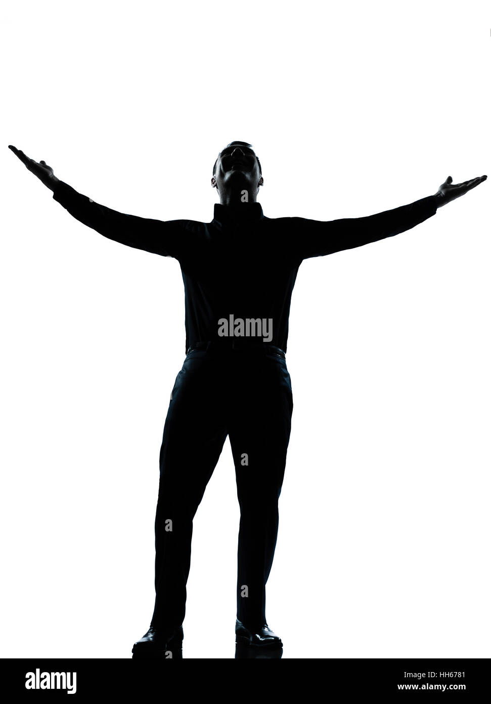 Un business caucasica uomo felice braccia tese silhouette a piena lunghezza in studio isolato su sfondo bianco Foto Stock