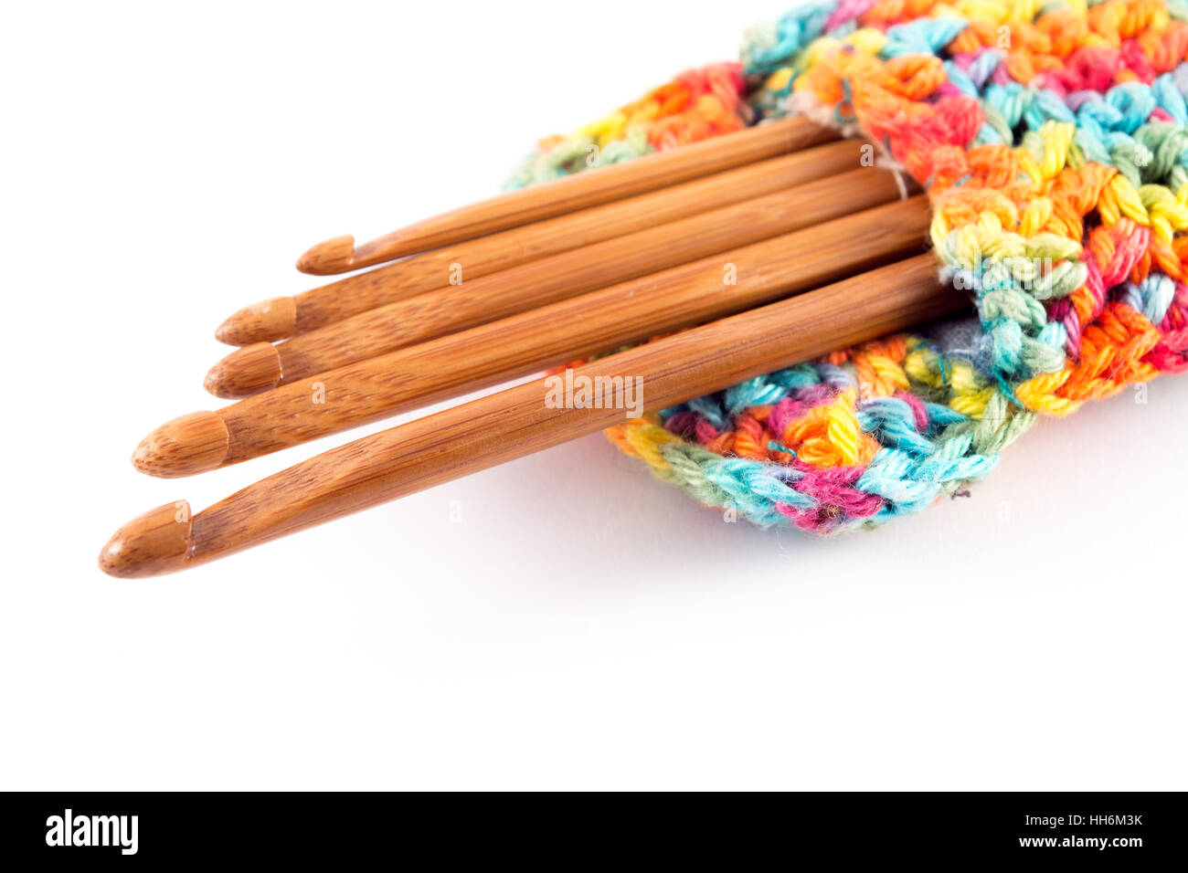 Crochet in legno ganci nel sacchetto colorato Foto Stock