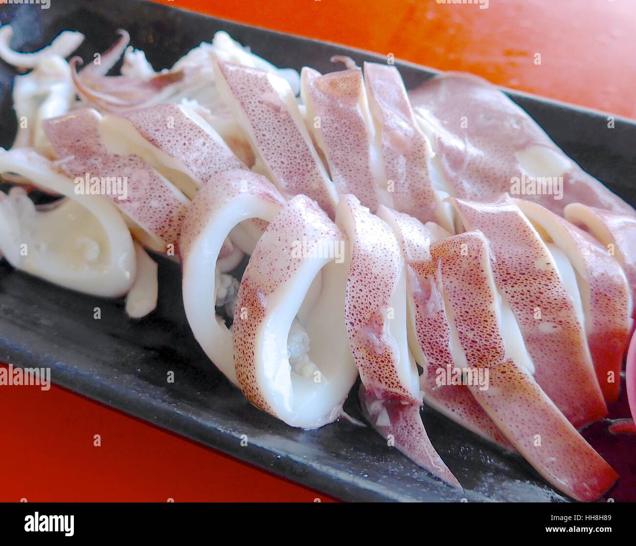 Calamari tagliati a fettine closeup Foto Stock