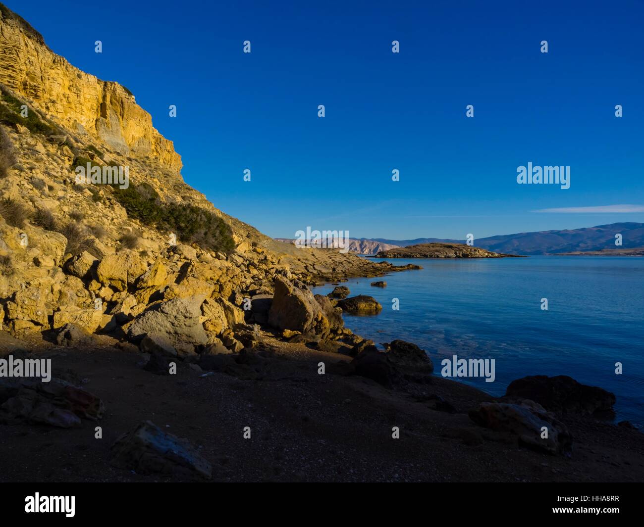 Lopar sull isola di Rab la luce del mattino costa sul mare calmo di pietra paesaggio di mare scenic Foto Stock