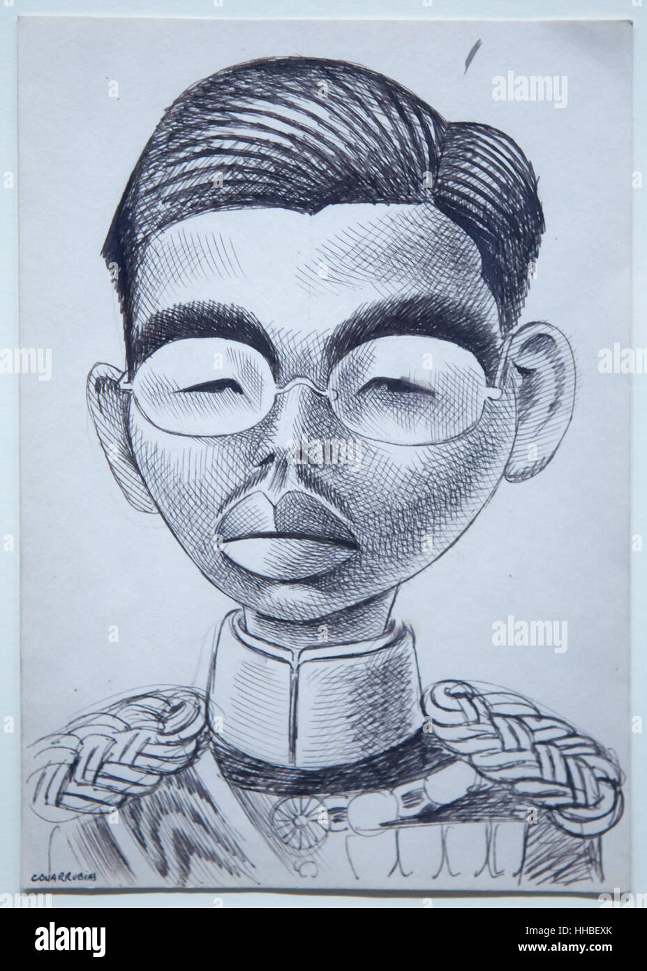 La caricatura dell'imperatore Showa del Giappone meglio noto come Hirohito dal caricaturista messicano Miguel Covarrubias per Collier's magazine esposti nella mostra dedicata all'arte messicana dal 1900 al 1950 nel Grand Palais di Parigi, Francia. La mostra viene eseguito in fino al 23 gennaio 2017. Foto Stock