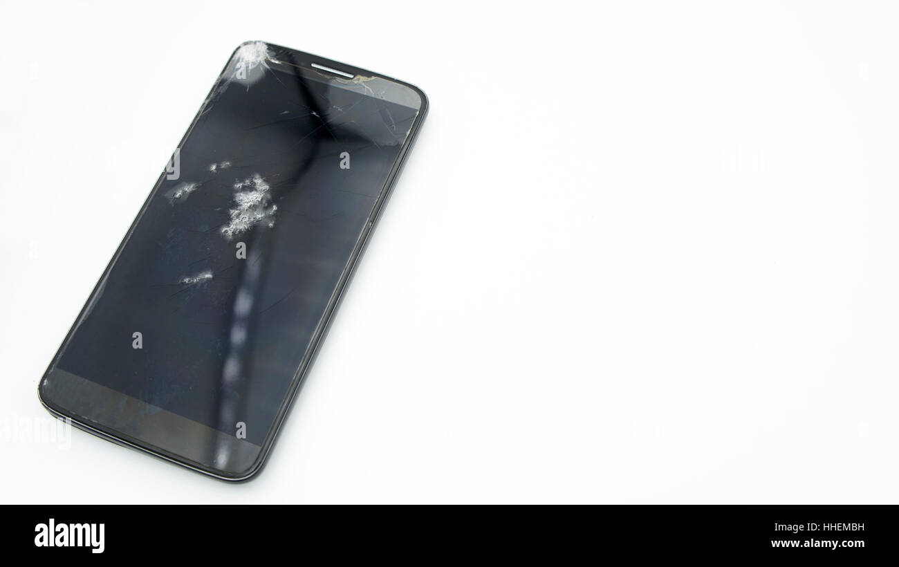 Smartphone Cellulari caduta sul terreno rotto Foto Stock