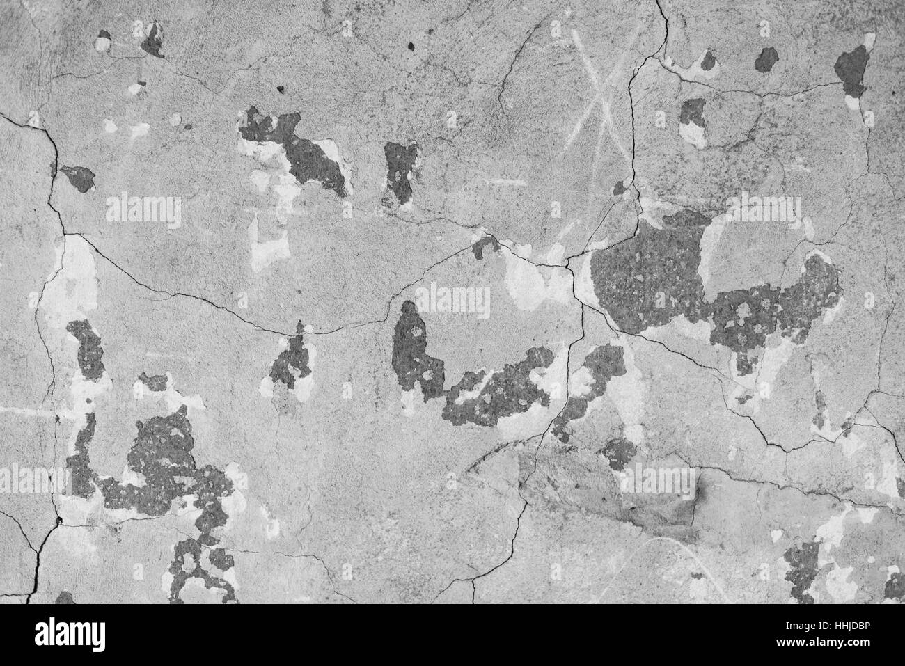 Vecchia macchiati di cemento grigio texture della parete dello sfondo. Foto Stock