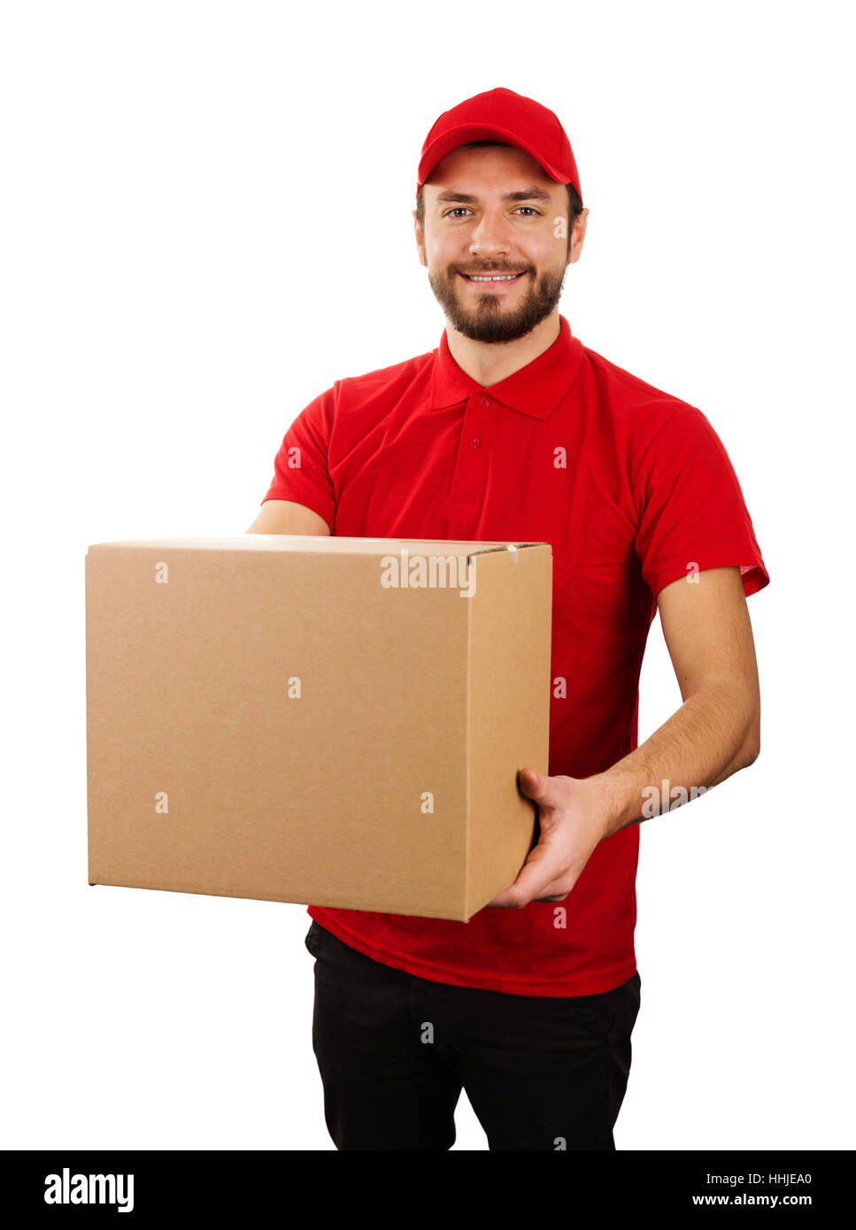 Servizio di consegna - il giovane sorridente corriere azienda scatola di cartone Foto Stock