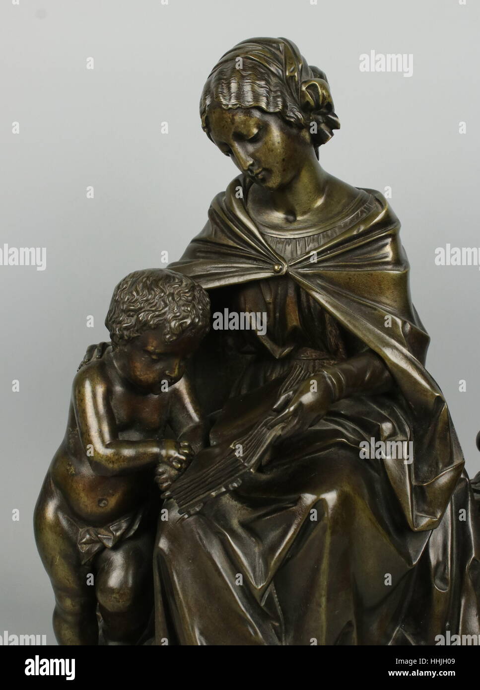 Antico Bronzo francese la madre e il bambino la lettura Foto Stock