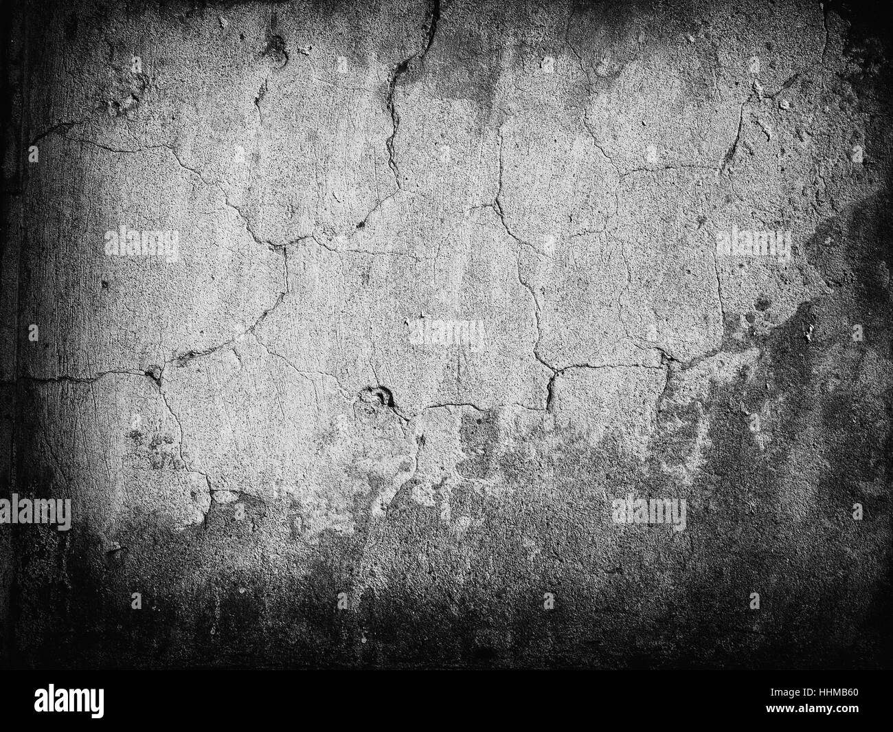 Il vecchio muro di cemento texture. incrinato grigio sfondo concreto Foto Stock